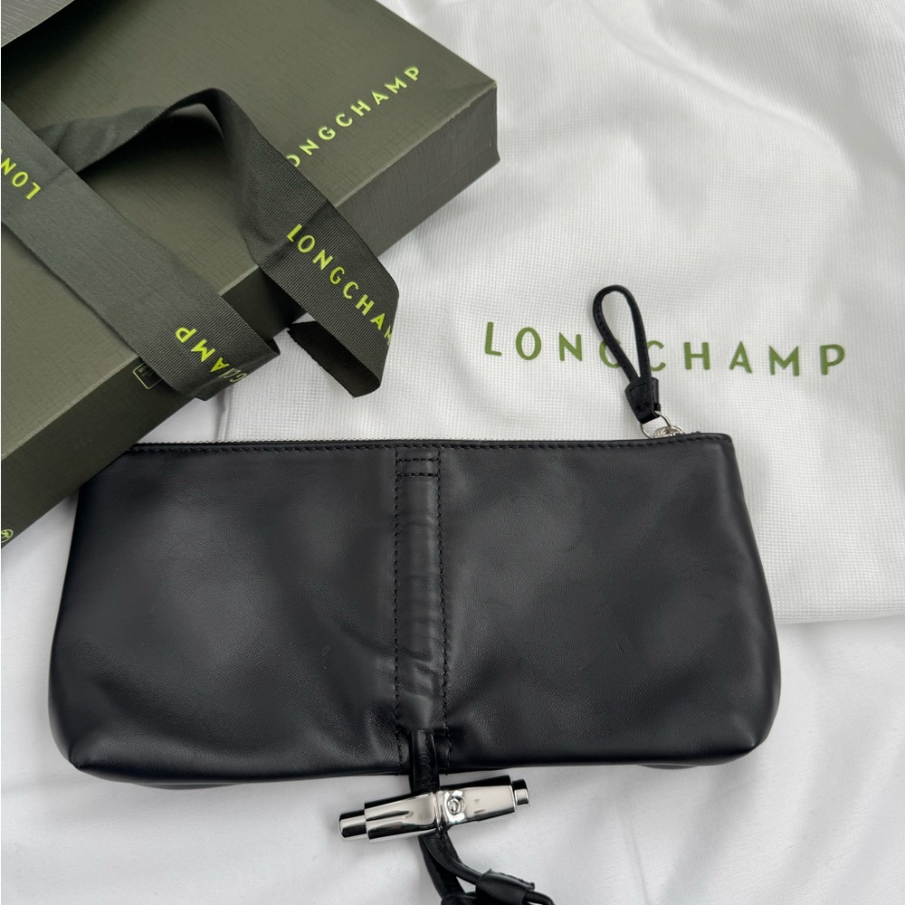 Longchamp Black Leather clutch 9 x 5 inches nwot